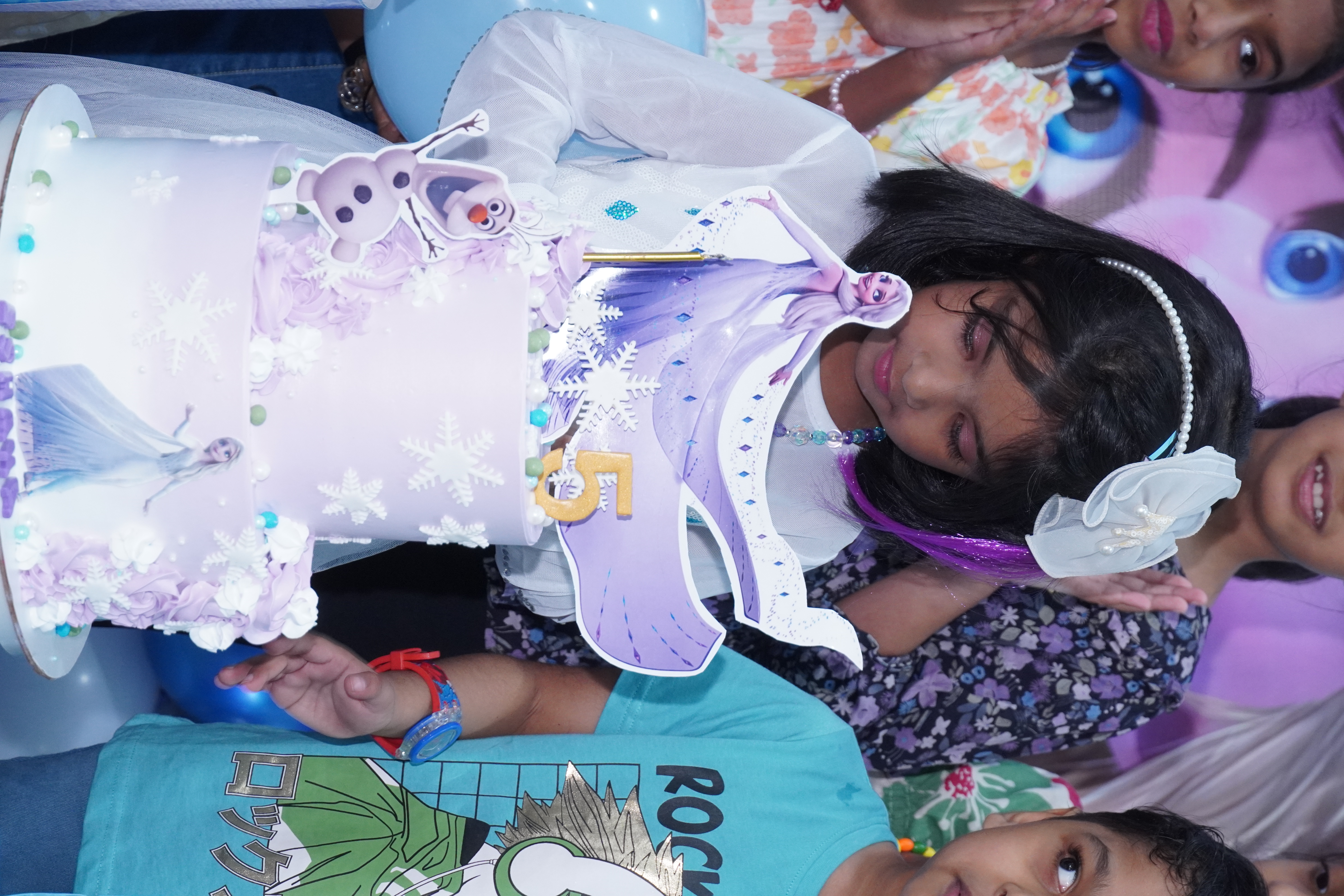 Kids enjoying party favors and gifts