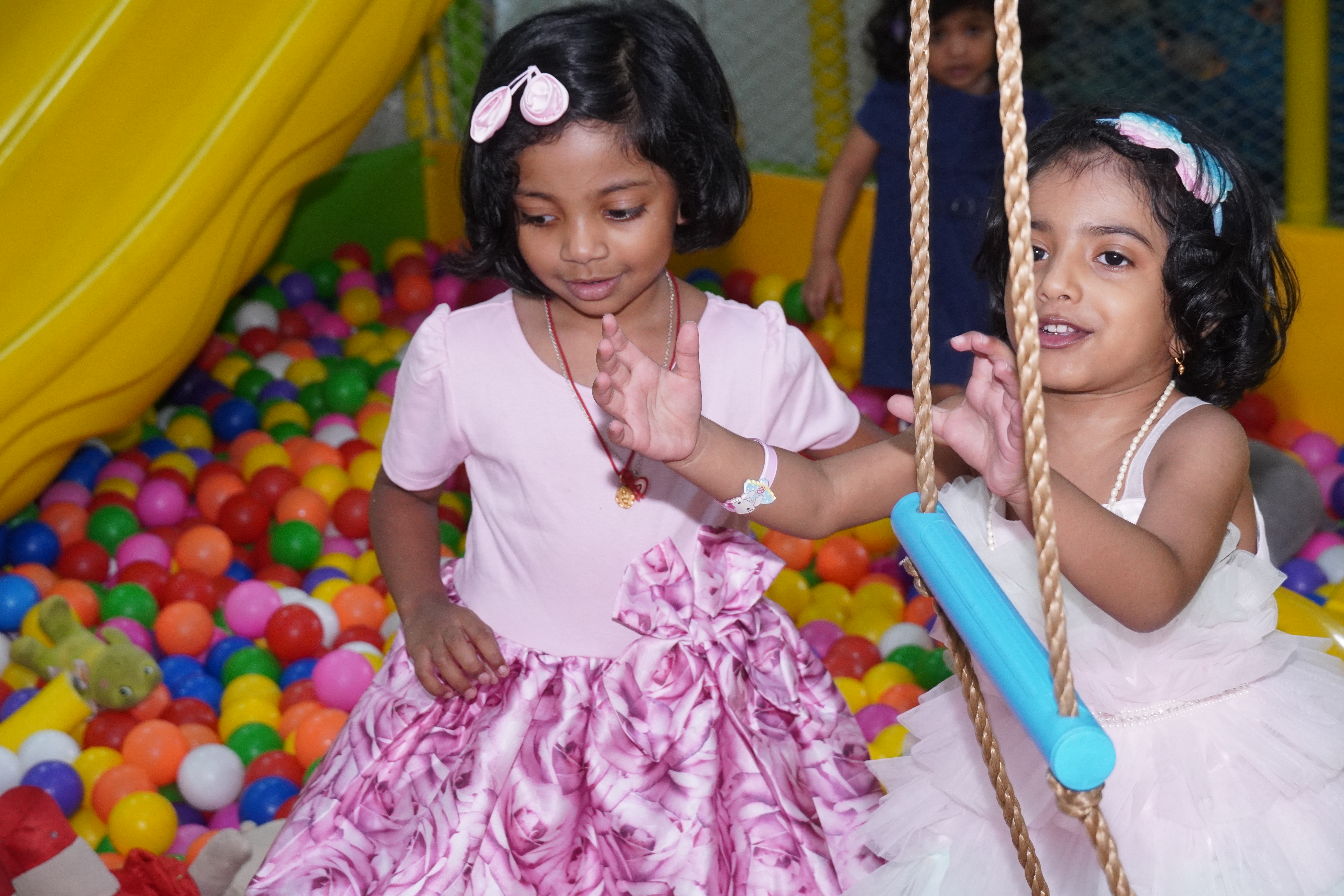 Children enjoying interactive gaming zone