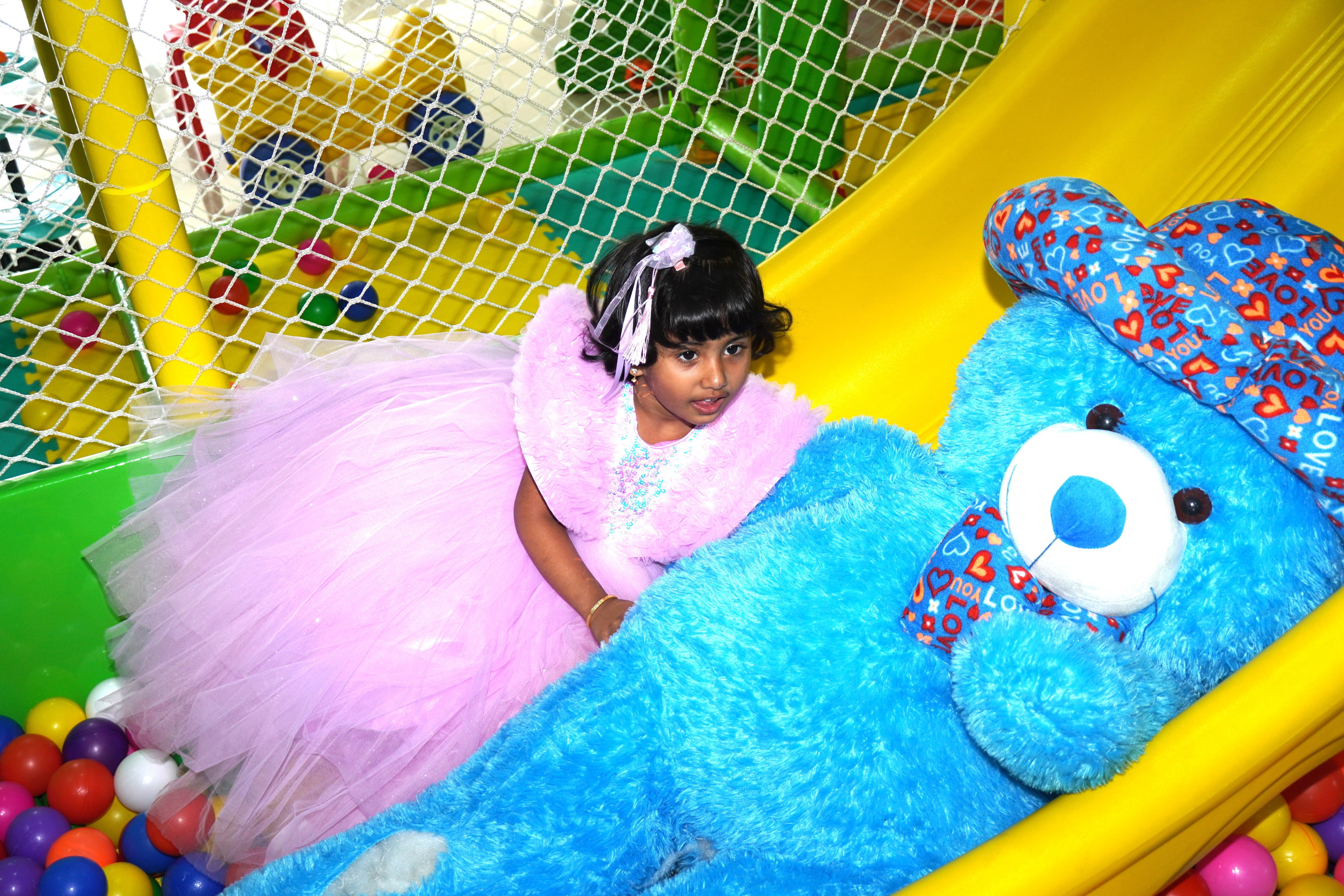 Kids playing in soft play area